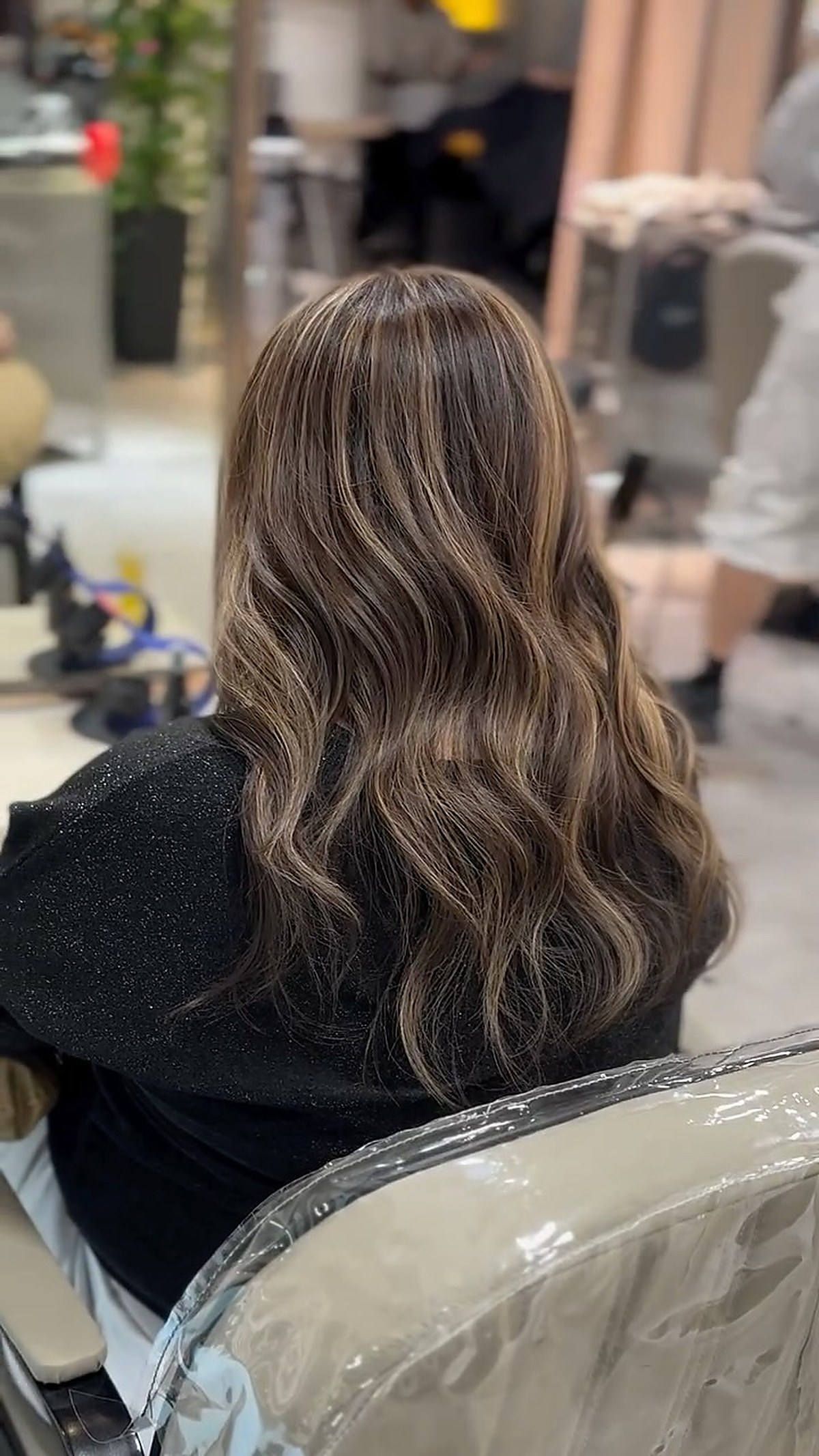 Long wavy hair styling, soft body