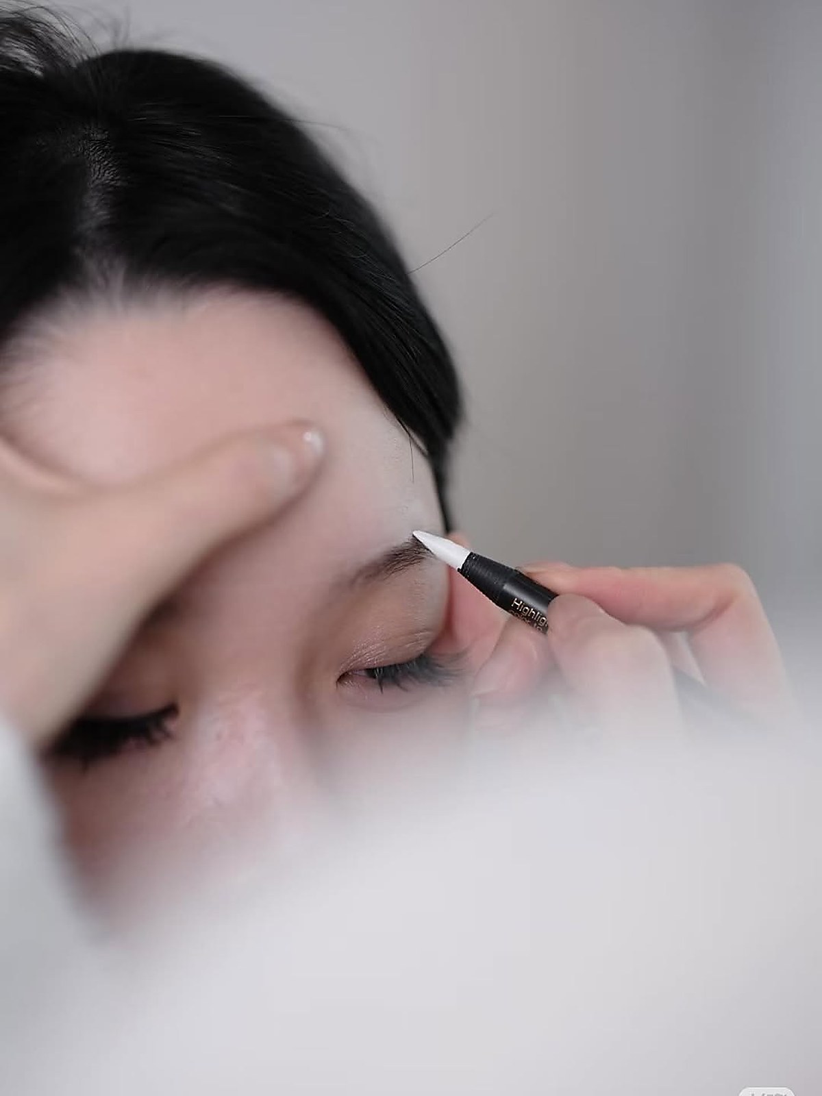 Eyeliner embroidery application up close