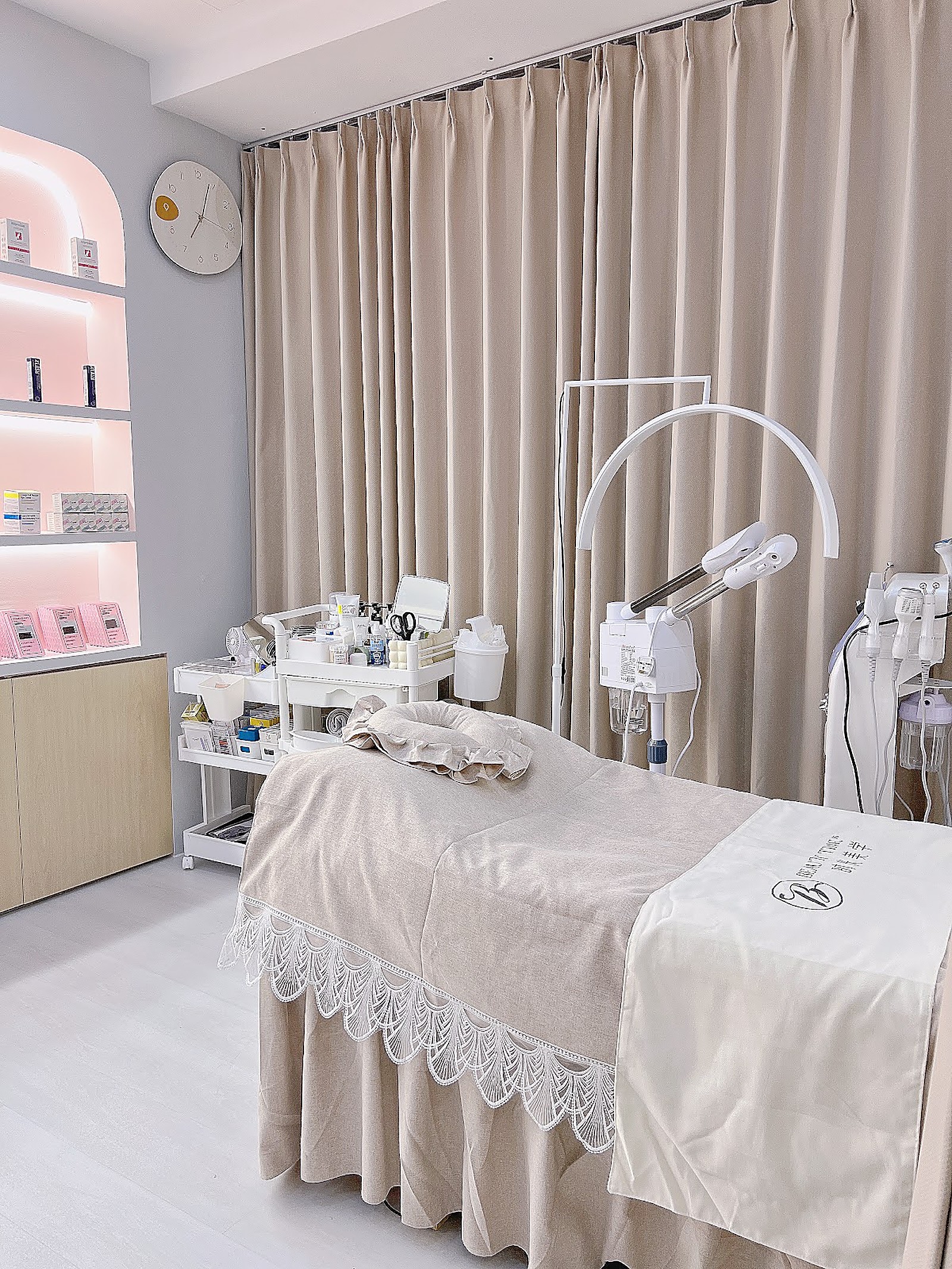 Modern spa treatment room with warm lighting and clean surfaces