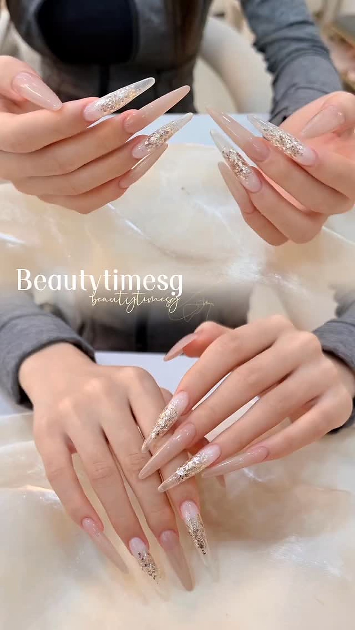 Acrylic nails with glitter detailing