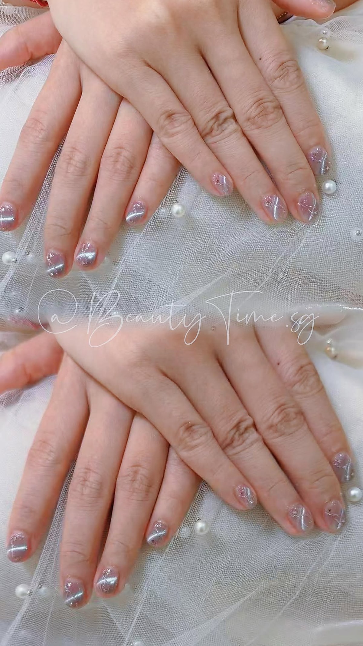 Bridal nail art with soft glitter accents