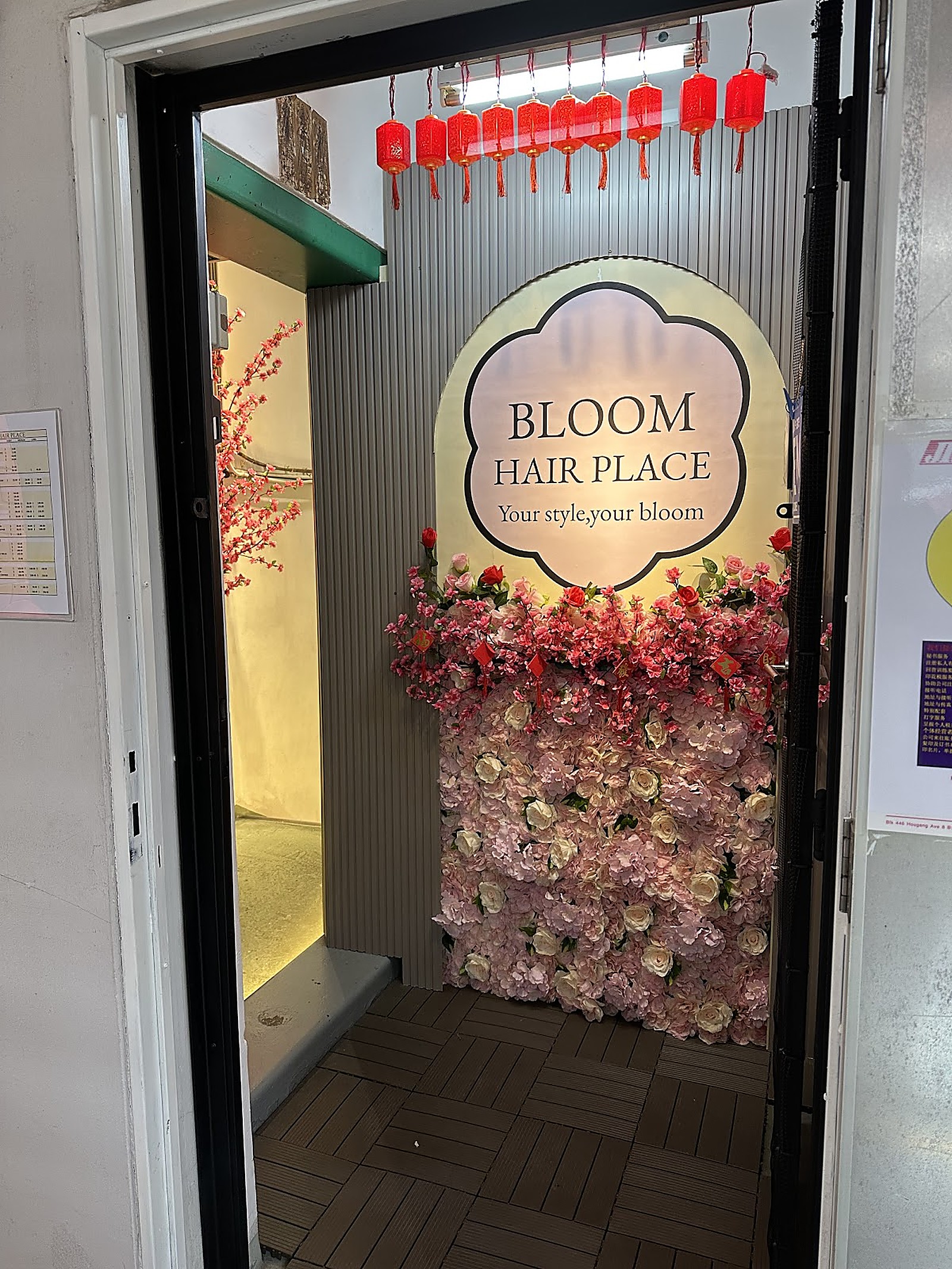 Salon entrance with floral decor at Bloom Hair Place