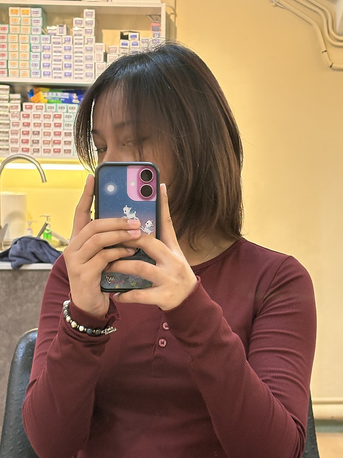 Mirror selfie inside the salon