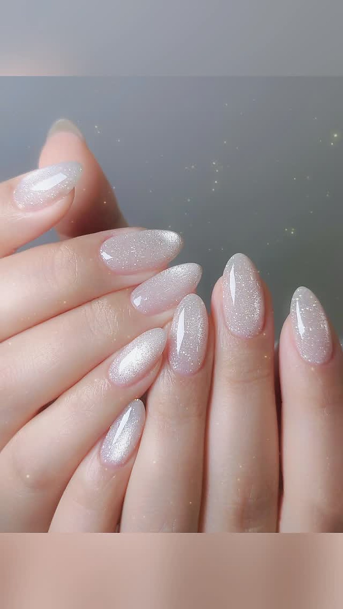 Glitter nail polish manicure with shimmer detail