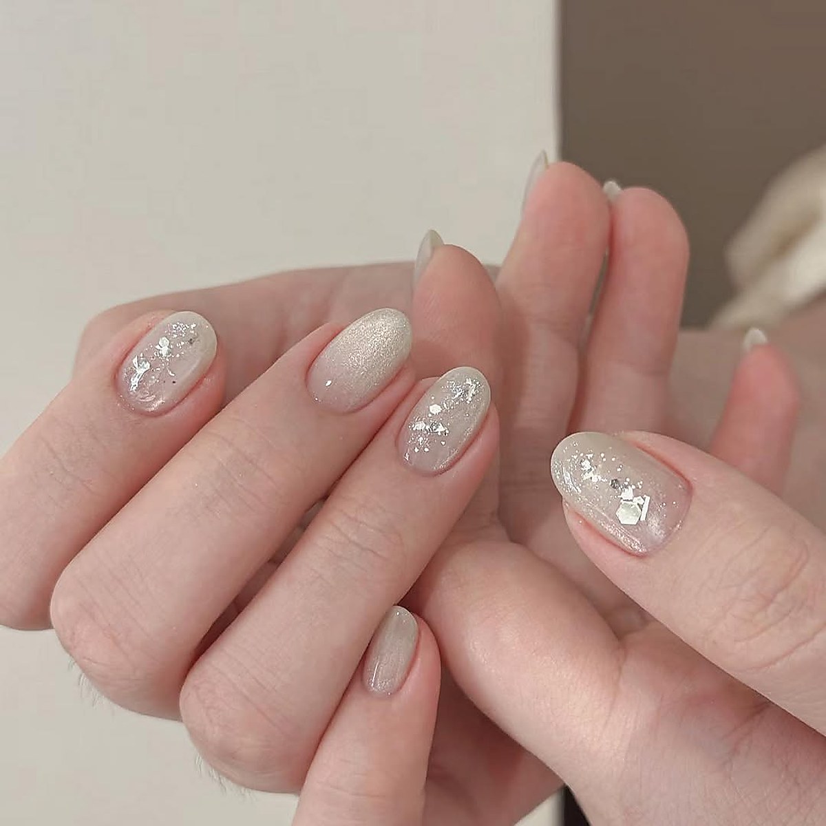 Manicure with sparkle nail art finish