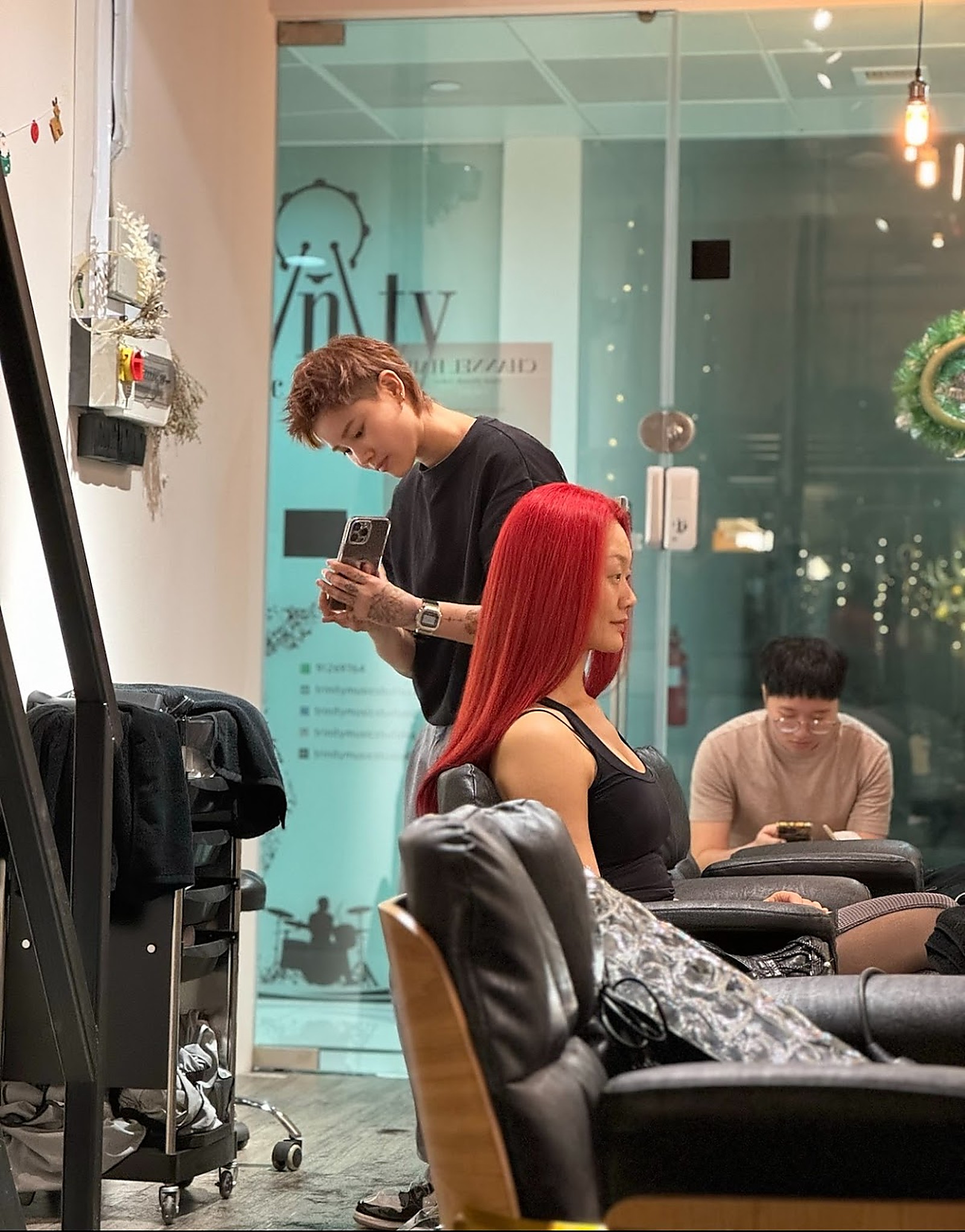 Red hair colour transformation result inside the Channel Hair studio