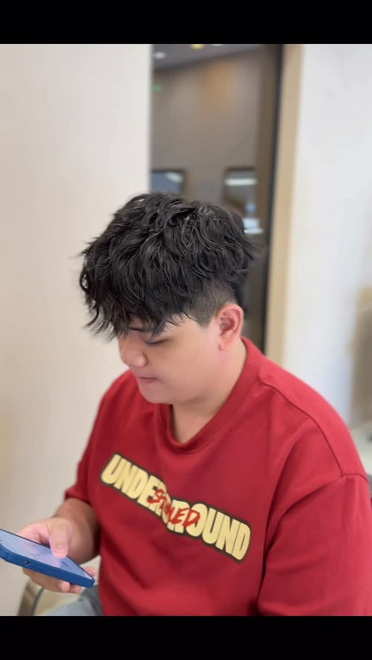 Modern textured haircut style finished at D hair salon