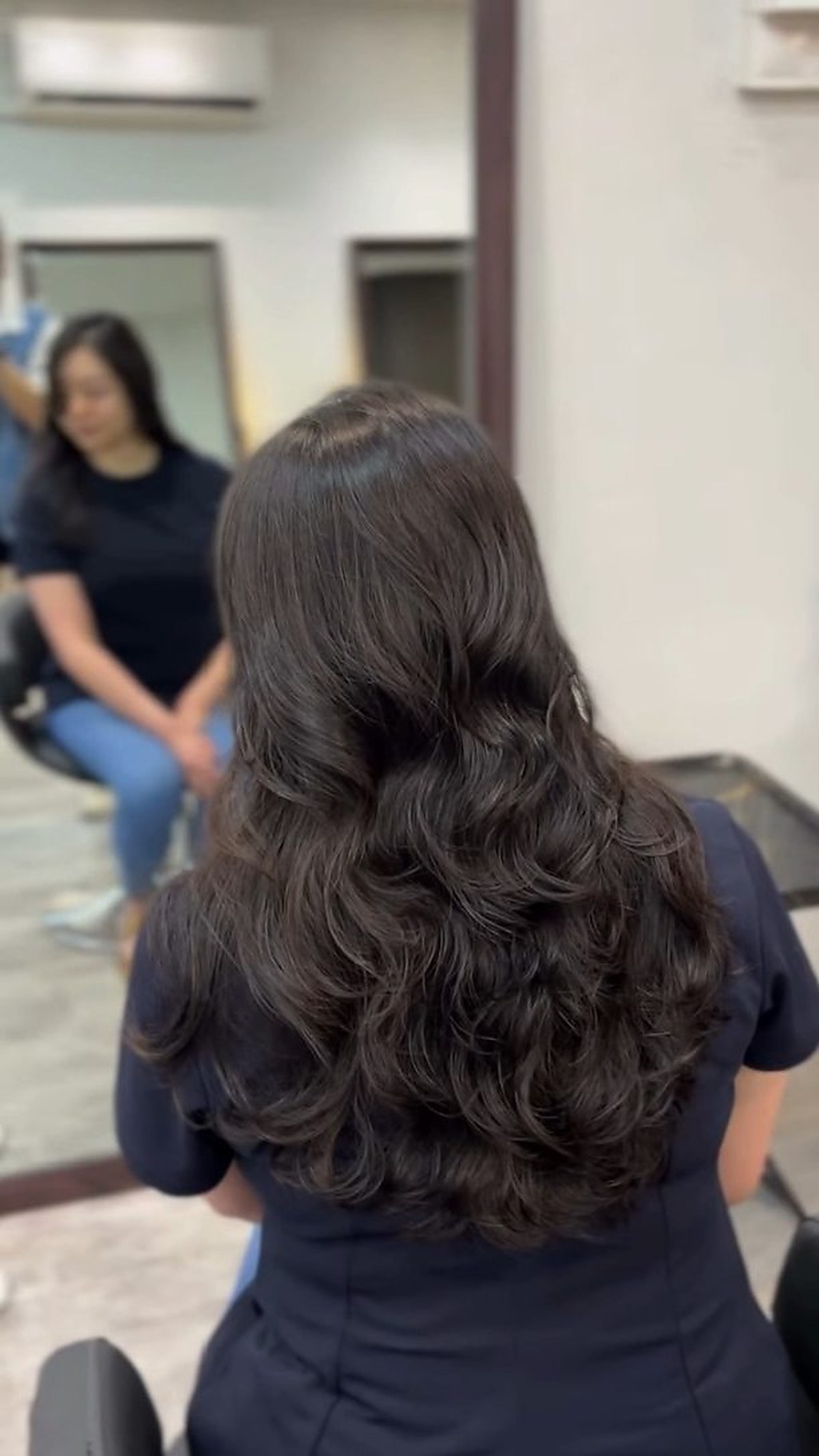 Long wavy hair styling result at D hair salon