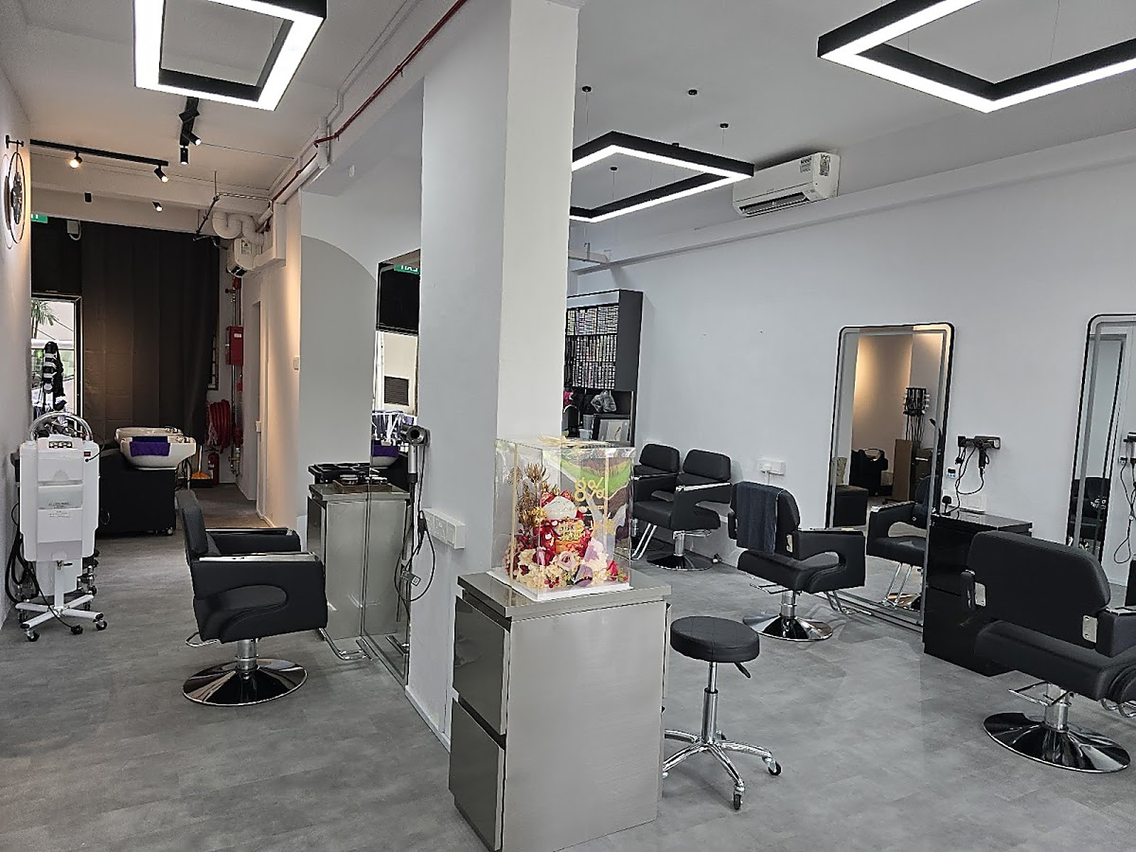 Modern salon interior space at Eight Percent Hair Salon