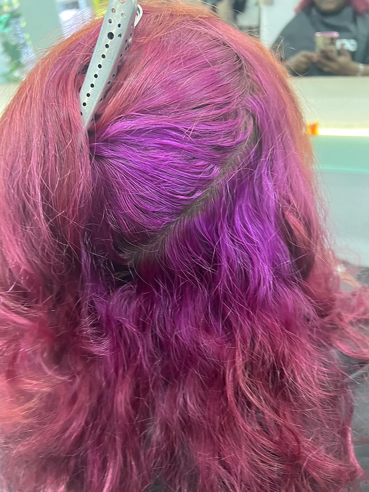Vibrant pink and purple hair colour