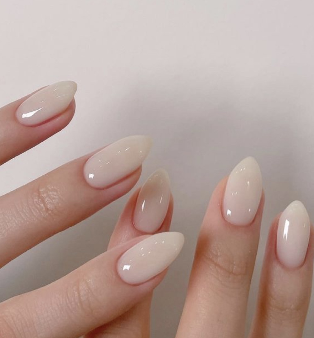 Nude nail polish manicure finished at Hers Nails