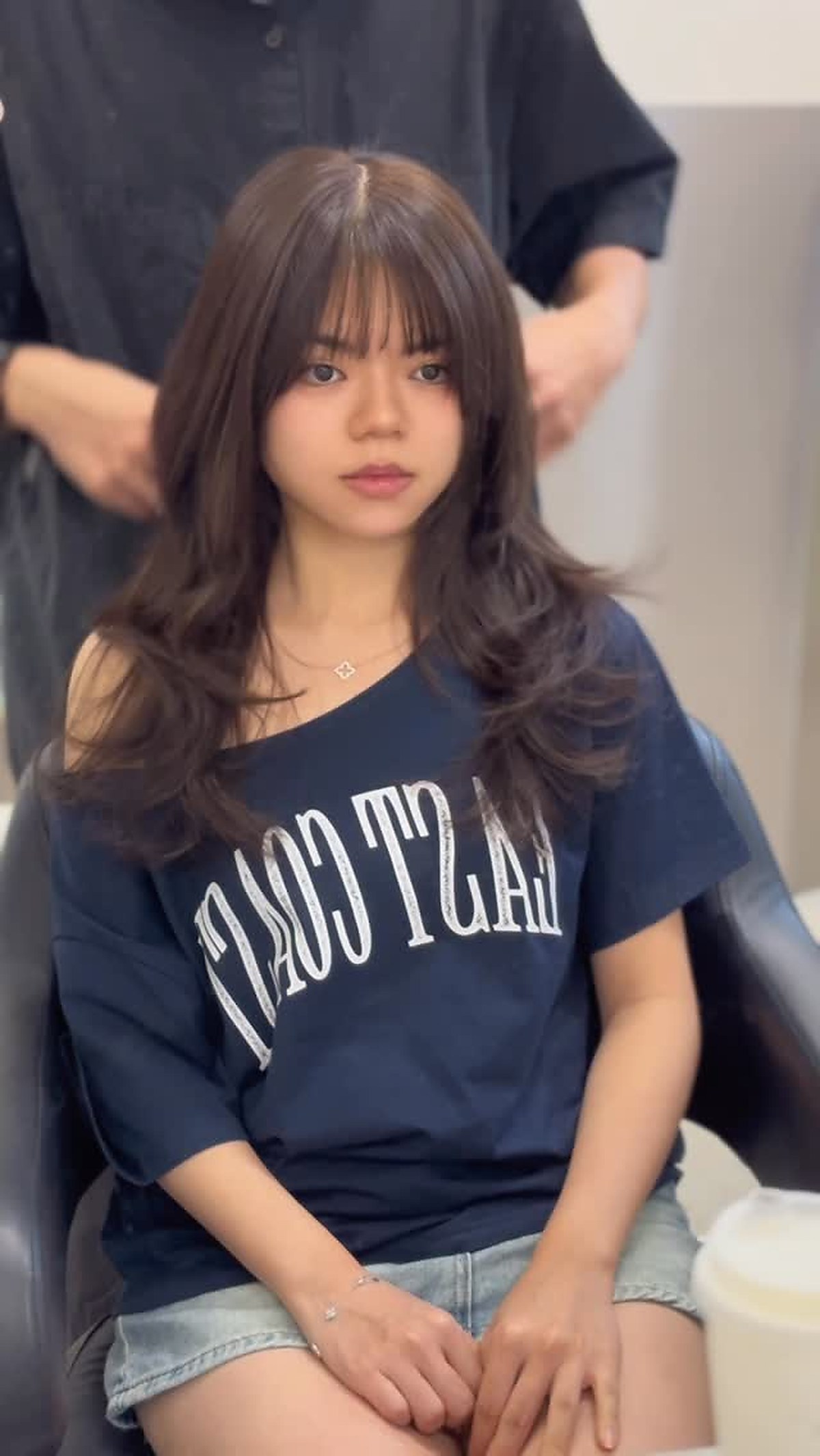 Medium length hair styling, shaped ends
