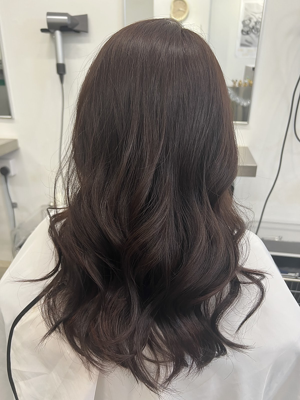 Long wavy hair styling, soft body