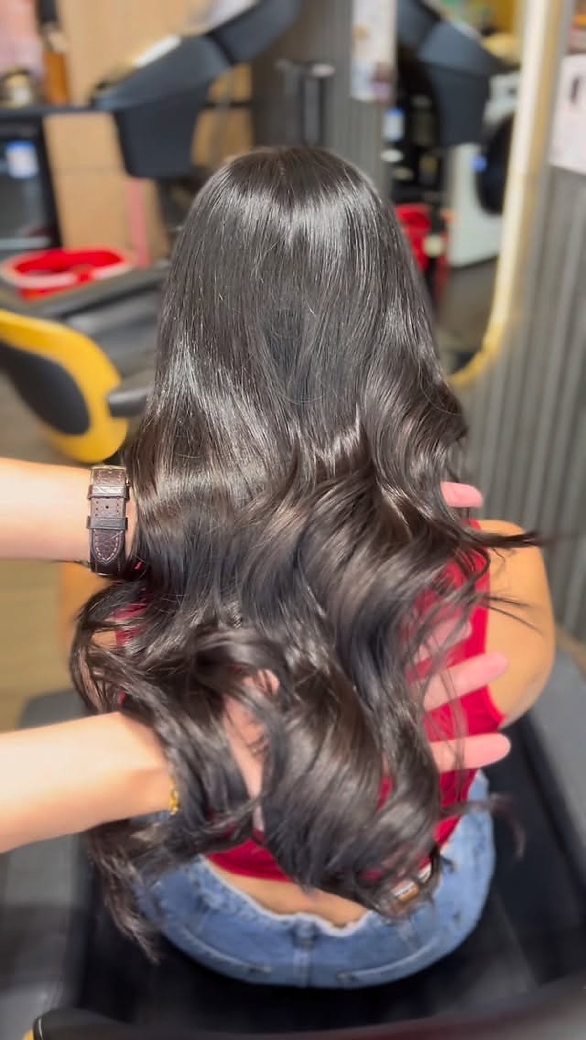 Long dark hair styling result