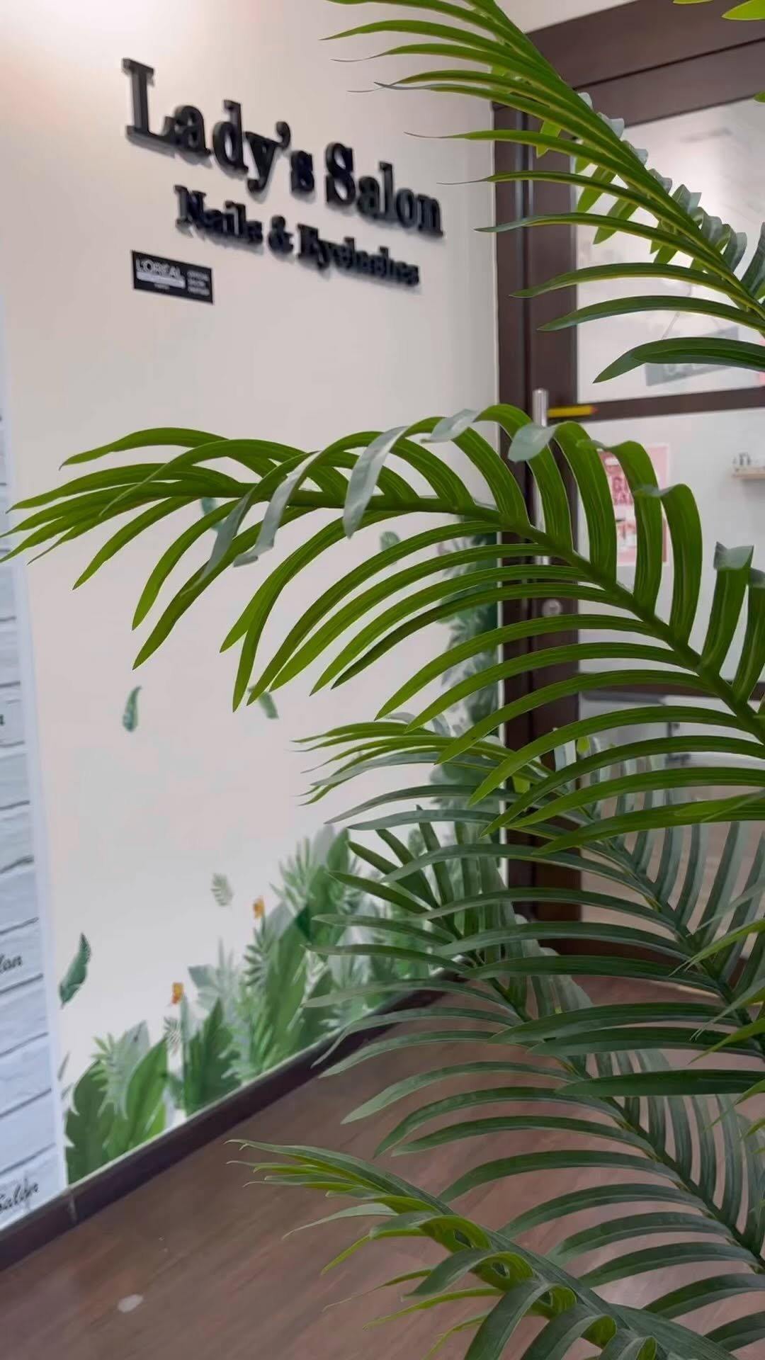 Salon interior with plant decor at JK2 Hair Beauty Salon