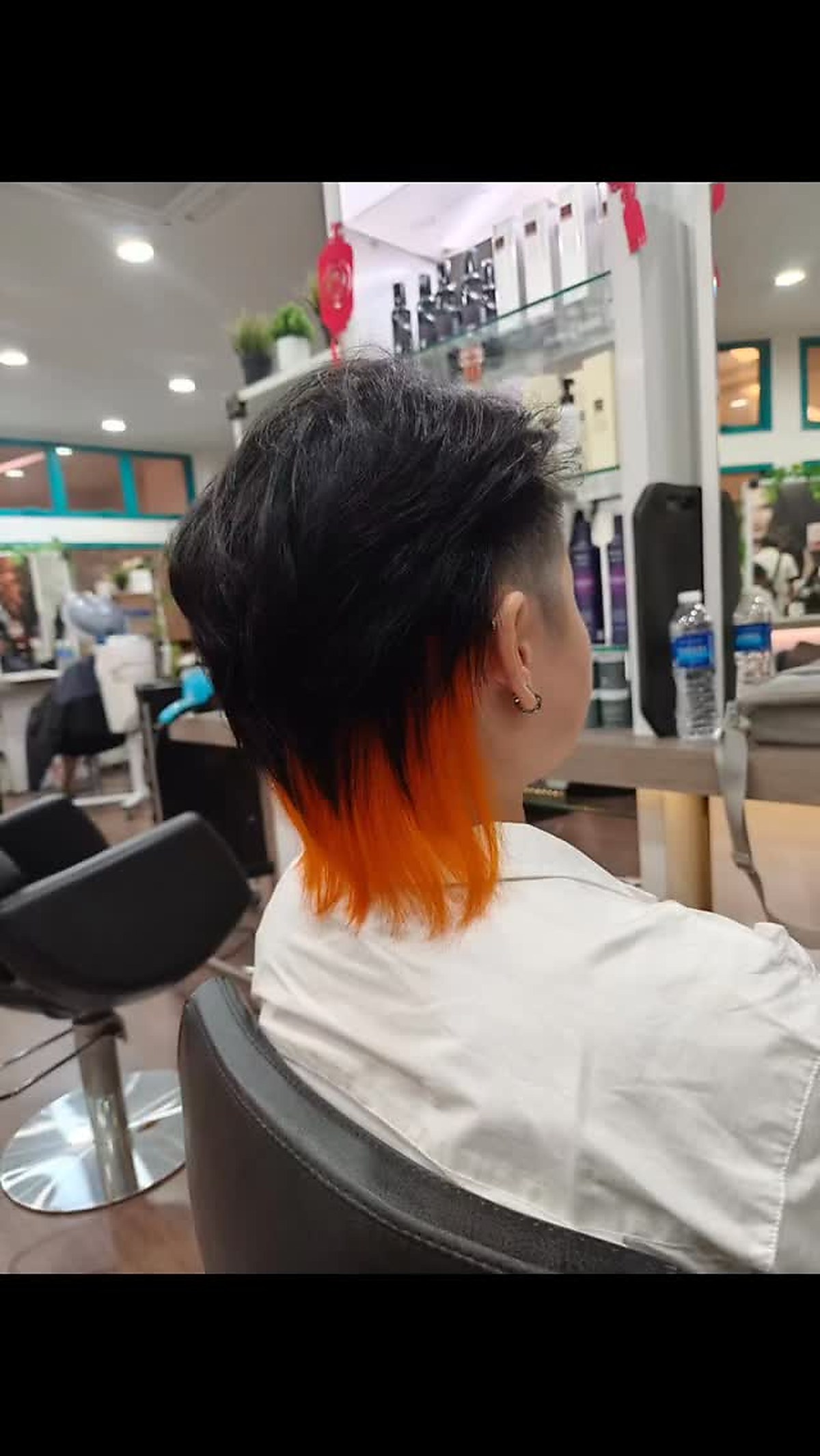 Black to orange hair colour transition