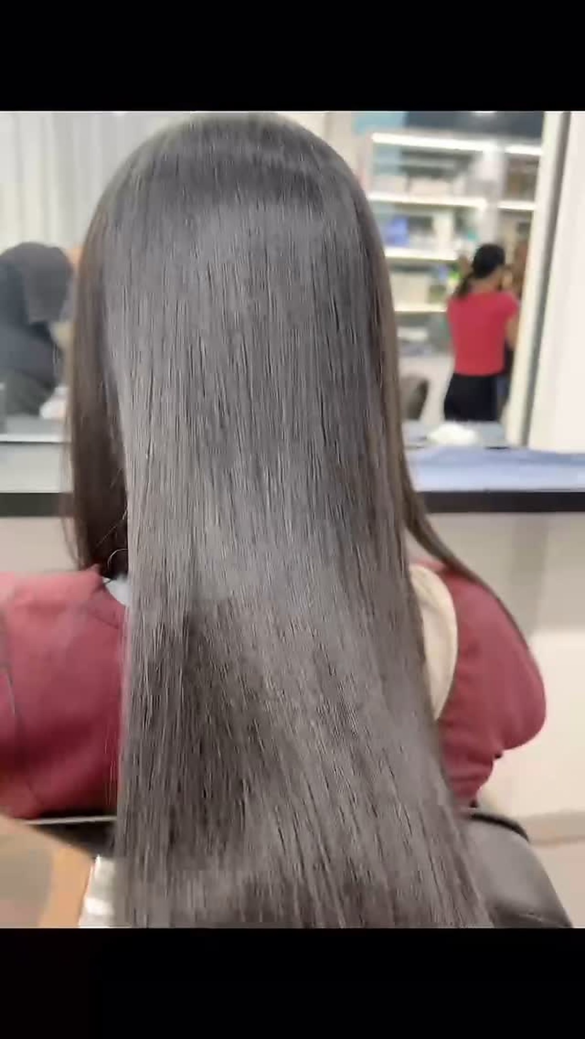 Long straight hair result after styling