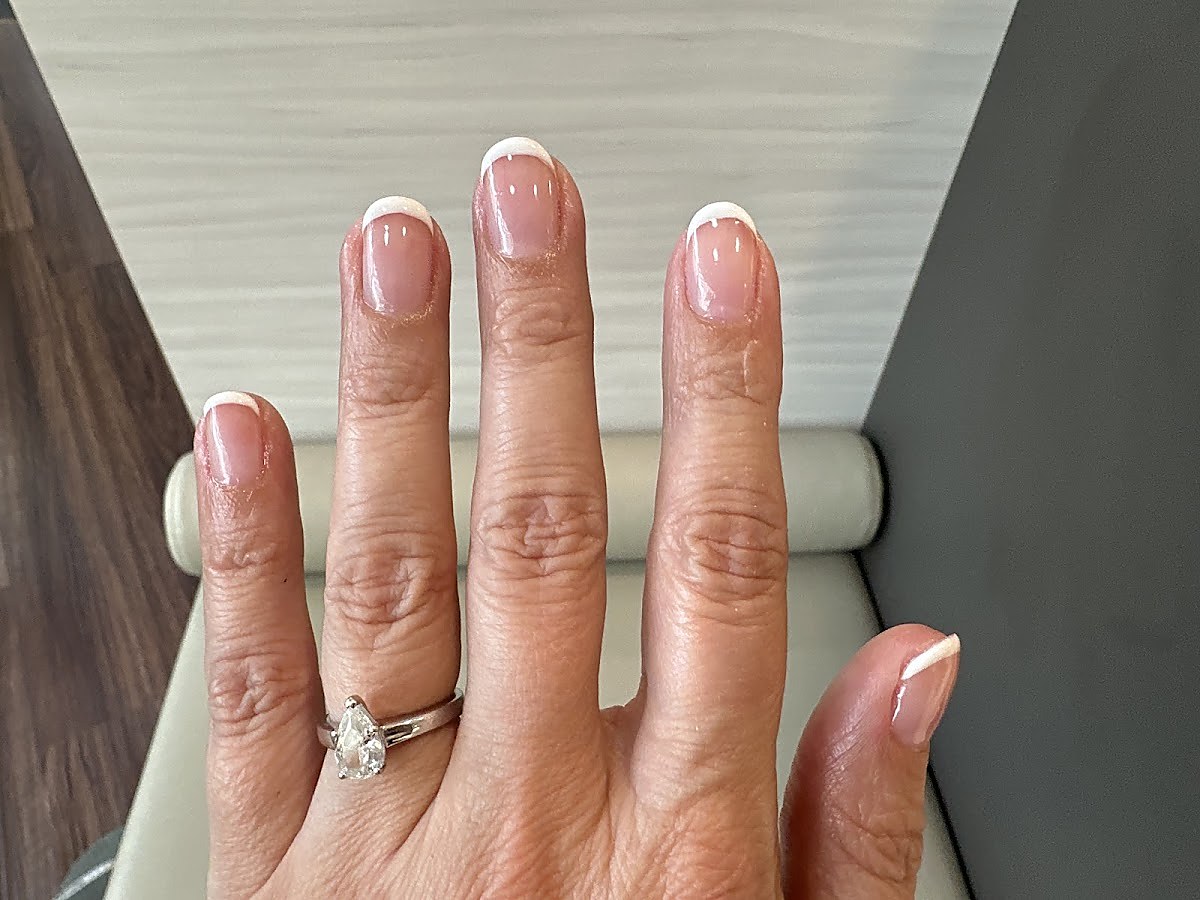 Manicure French tip nails, freehand finish