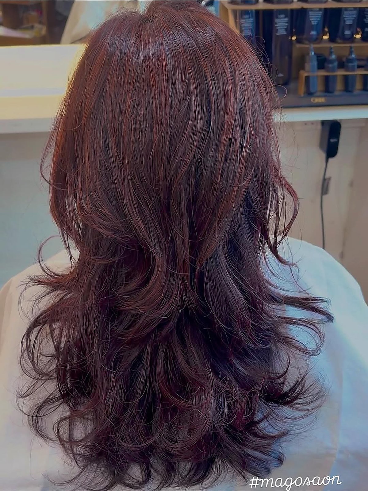 Long layered waves — finished hair result with soft natural movement