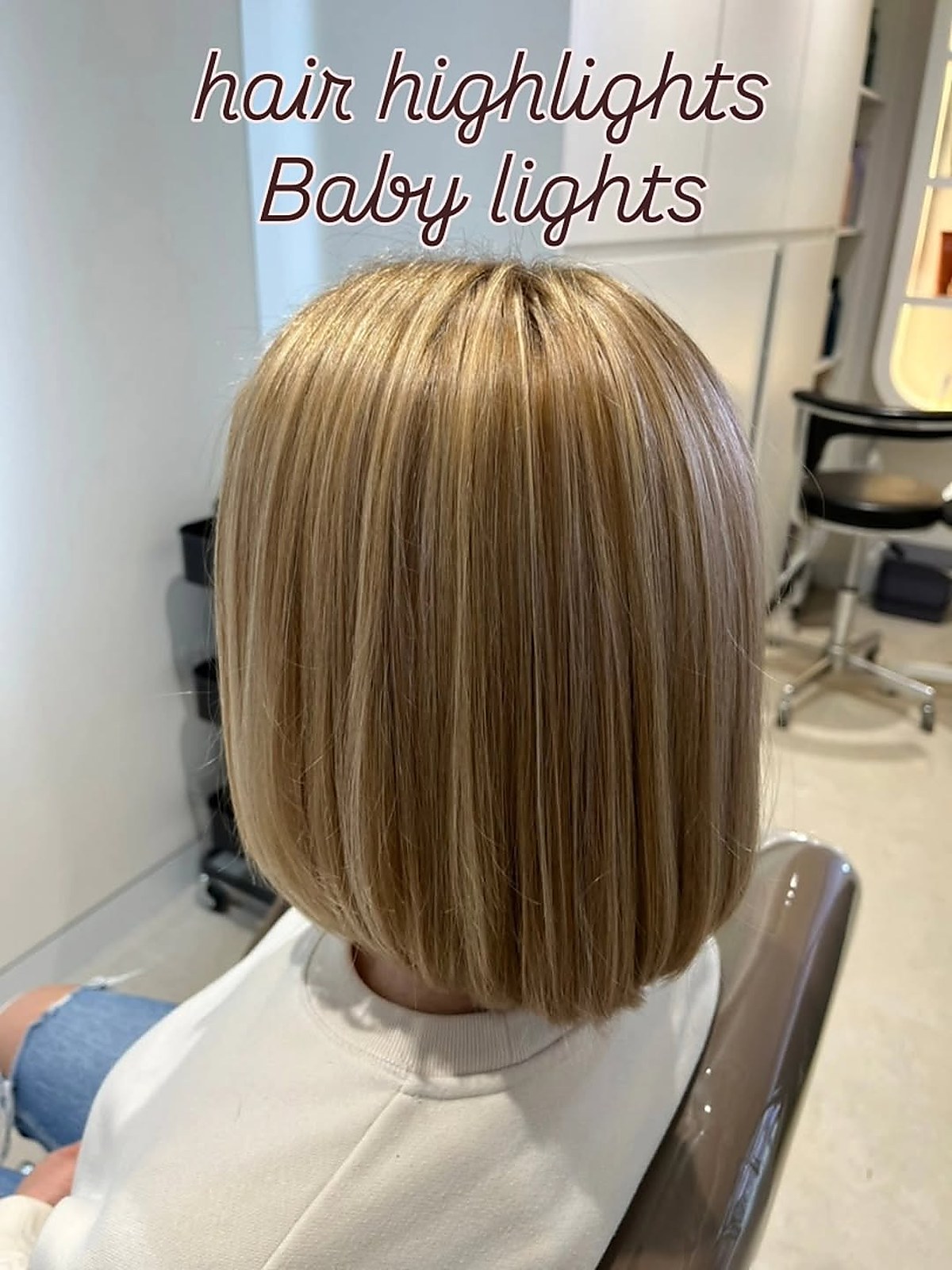 Blonde highlights on a soft bob cut