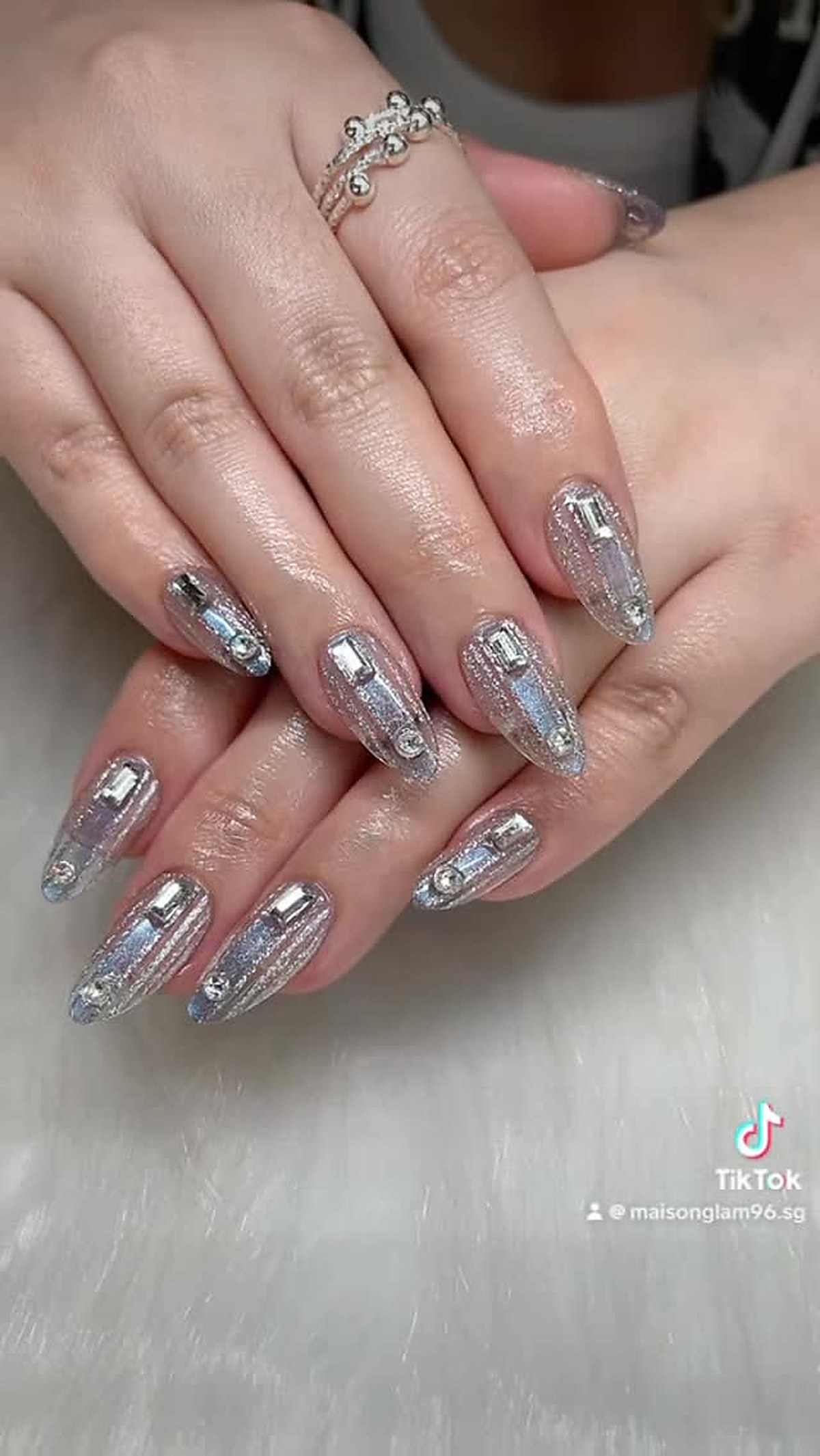 Luxury nail art with sparkle finish by Maison Glam