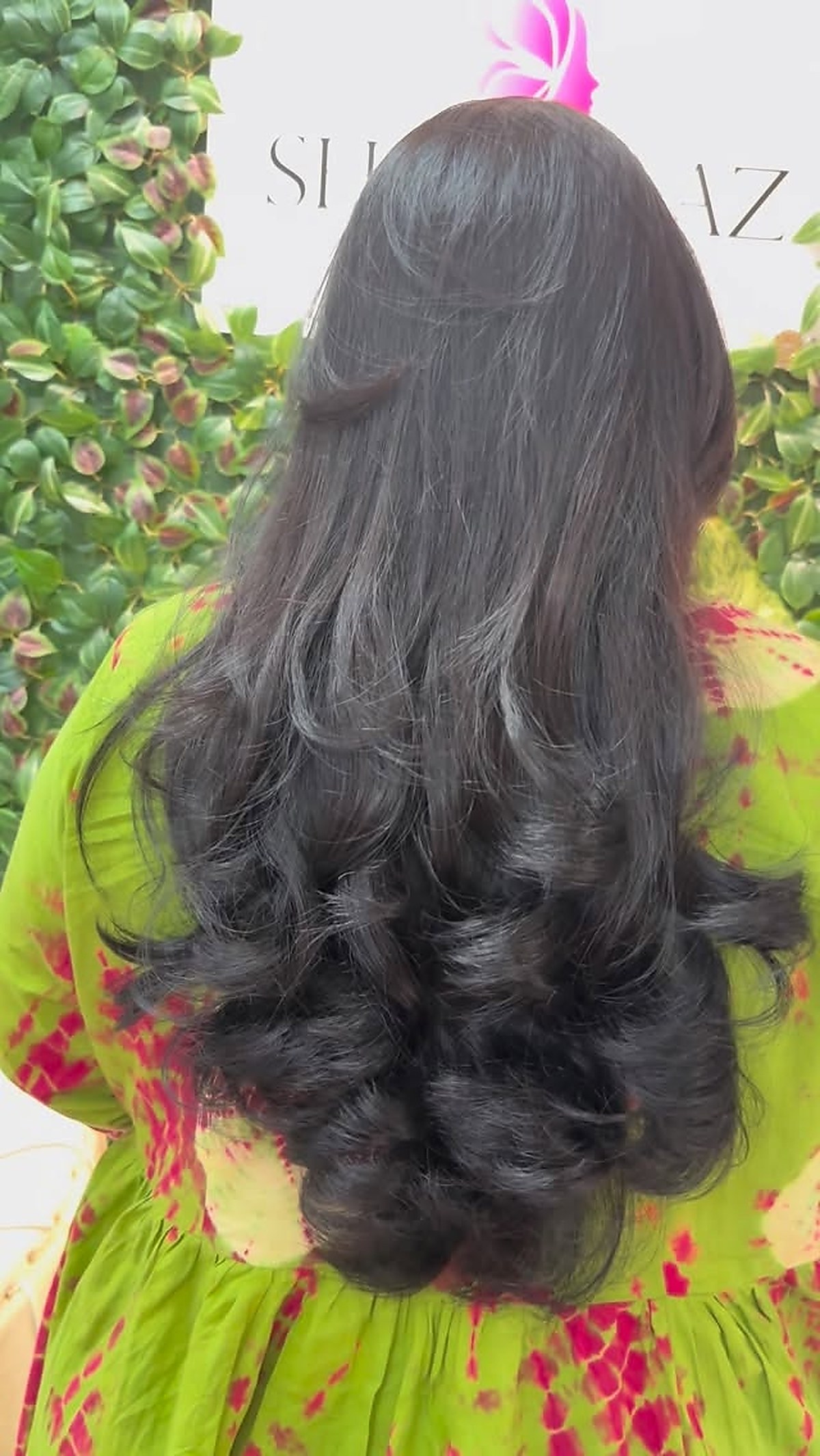 Long dark hair styling result