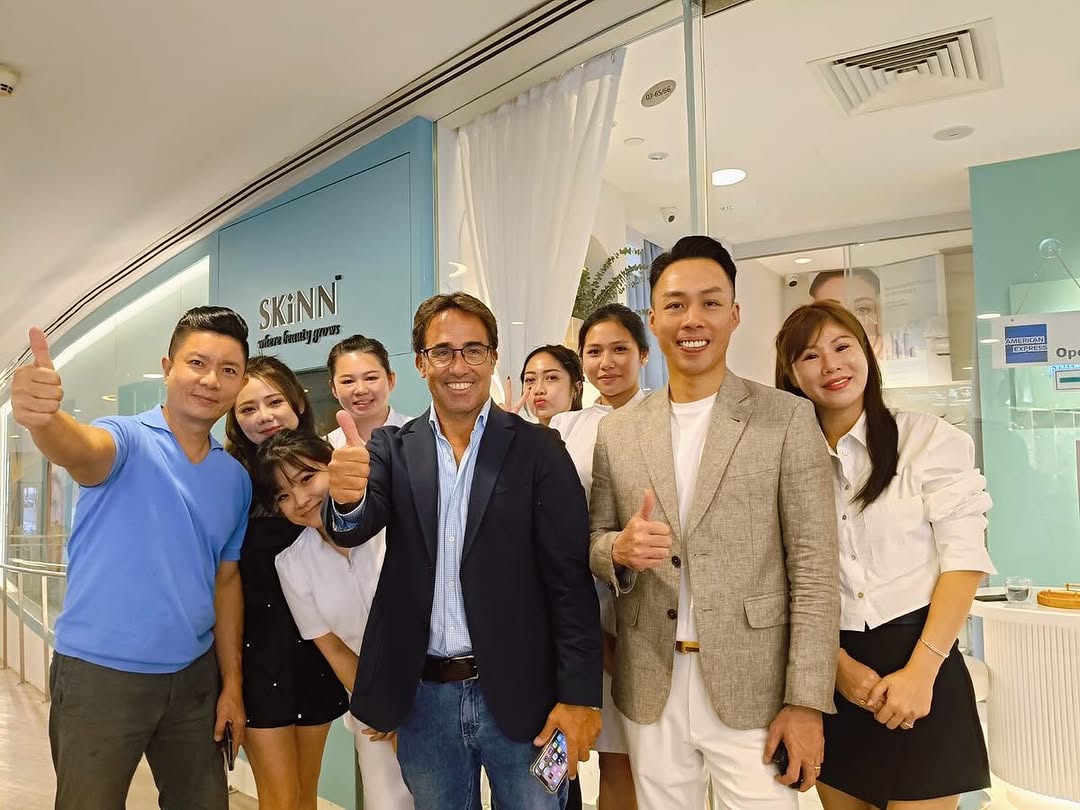 full team group photo at SKINNlash