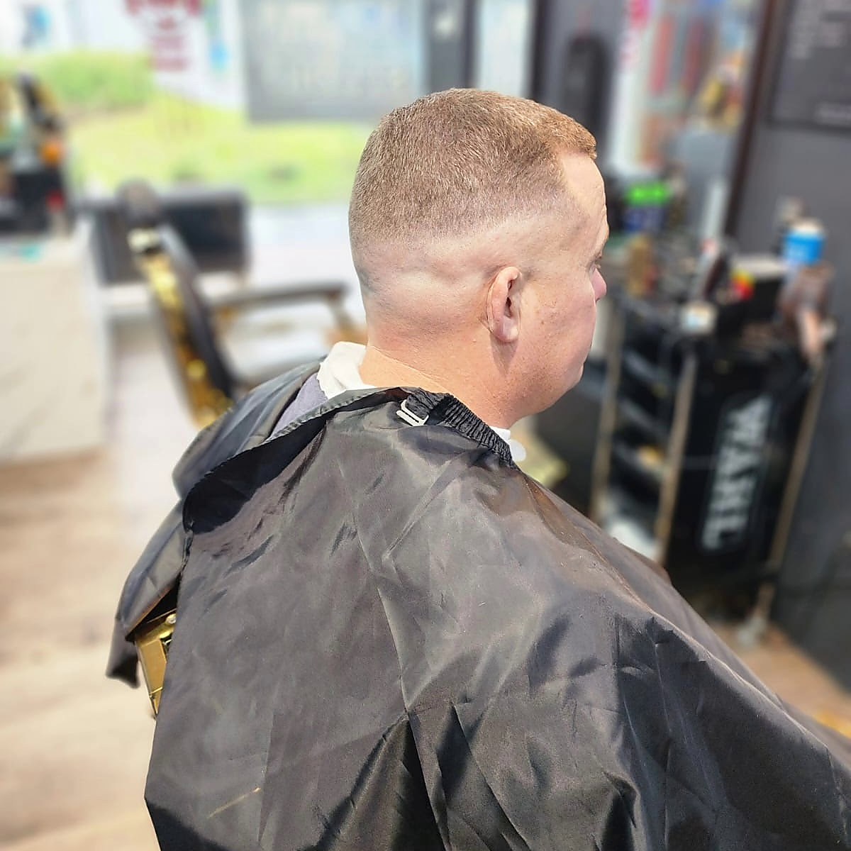 Short haircut with fade result