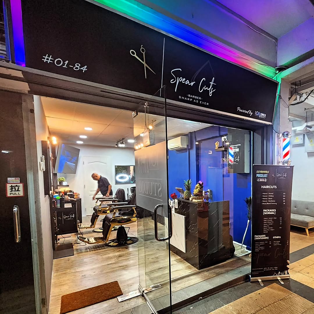 Modern barbershop interior storefront — Spear Cuts Barber