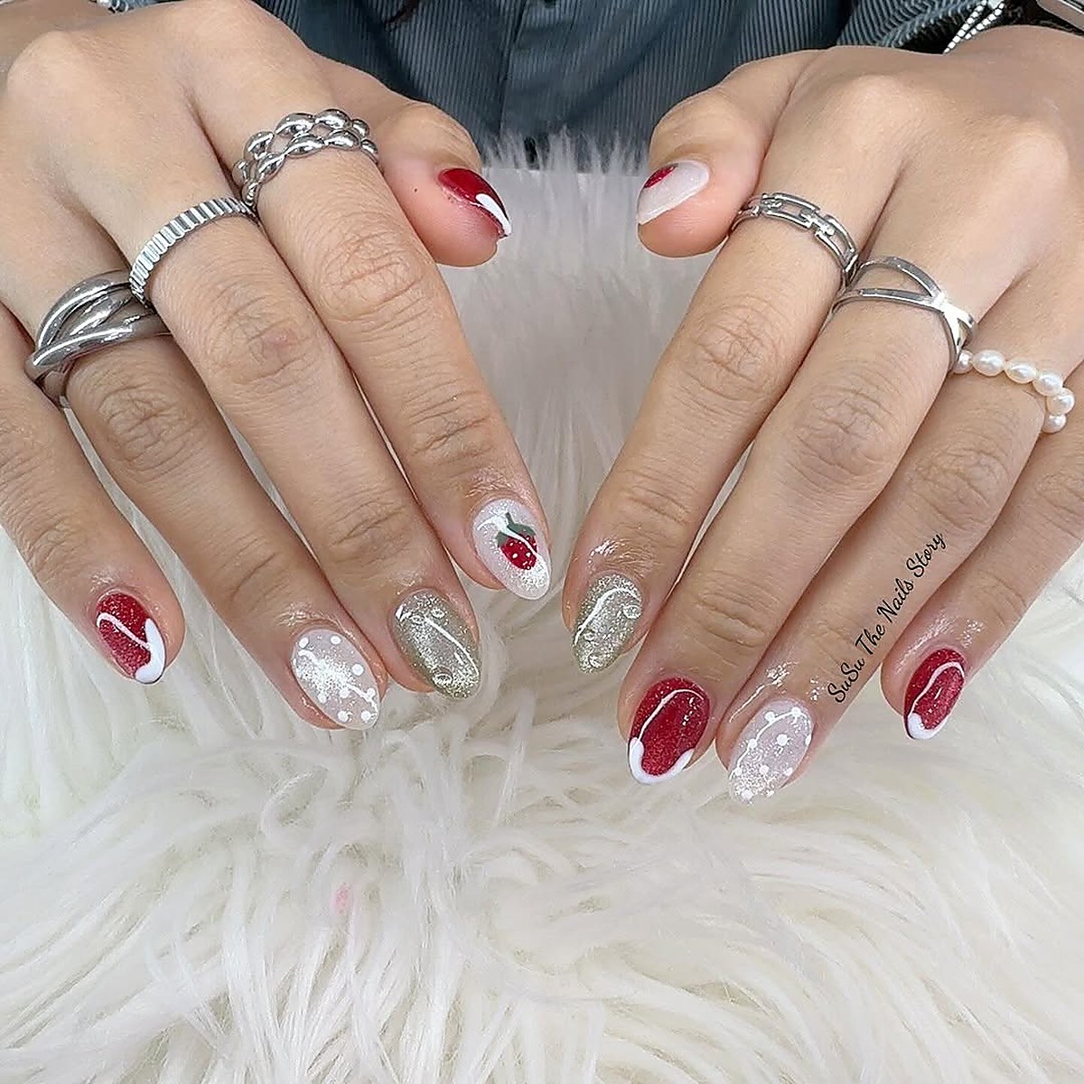 Festive nail art design with charms