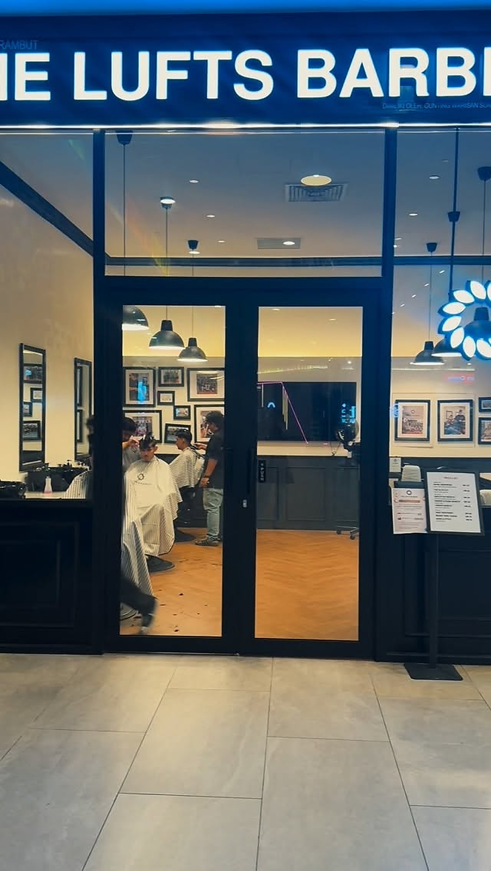 Inside The Lufts Barber — quiet, well-lit barbershop interior on Woodlands Street 11