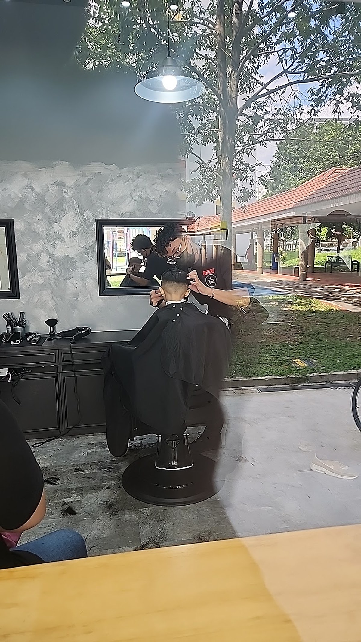 Finished haircut and styling result