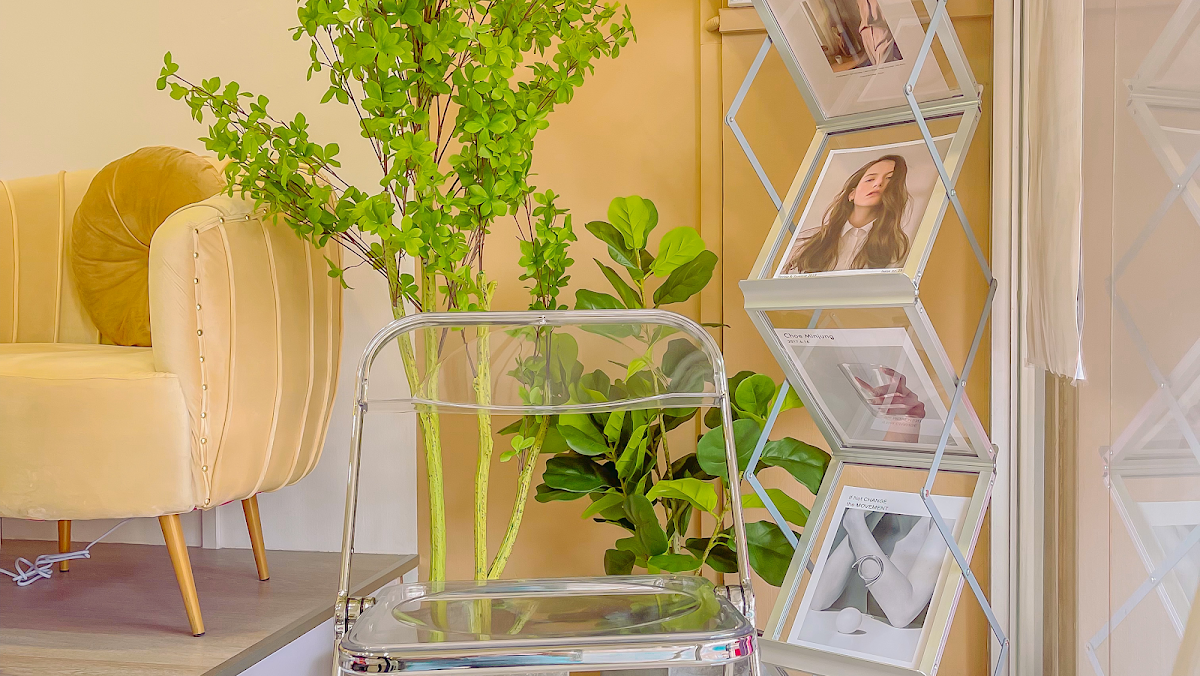 salon_interior_plants_decor — interior of The Nail Place studio with soft plants and warm decor