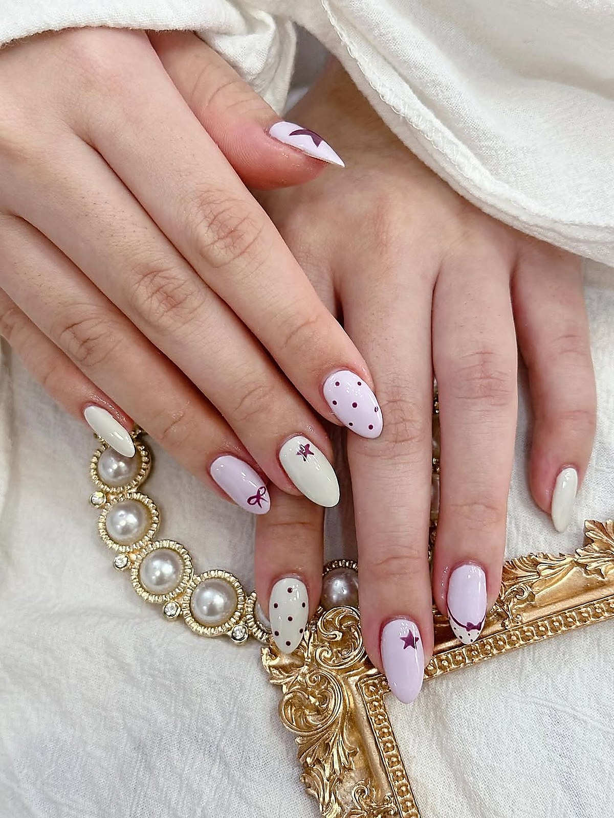 nail_art_manicure_design — soft considered nail art finish at The Nail Place