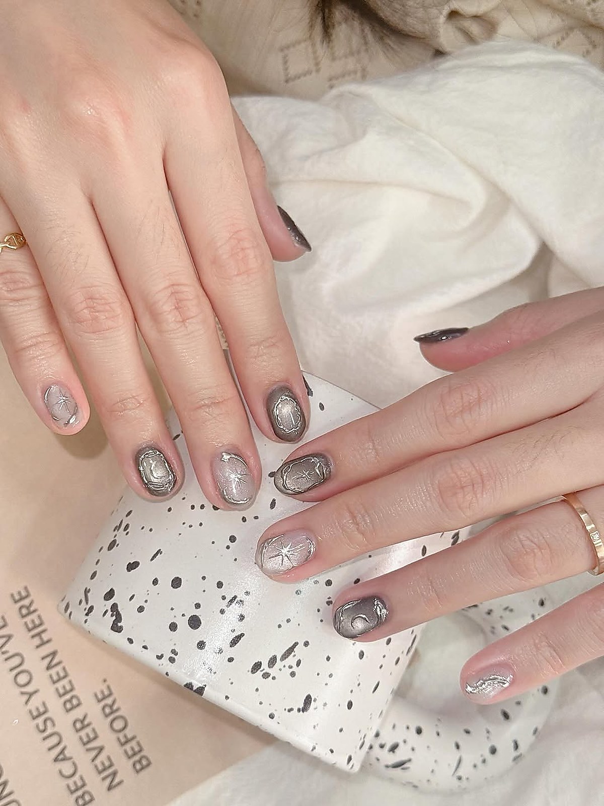 nail_art_manicure_result — completed manicure with subtle hand-painted detail