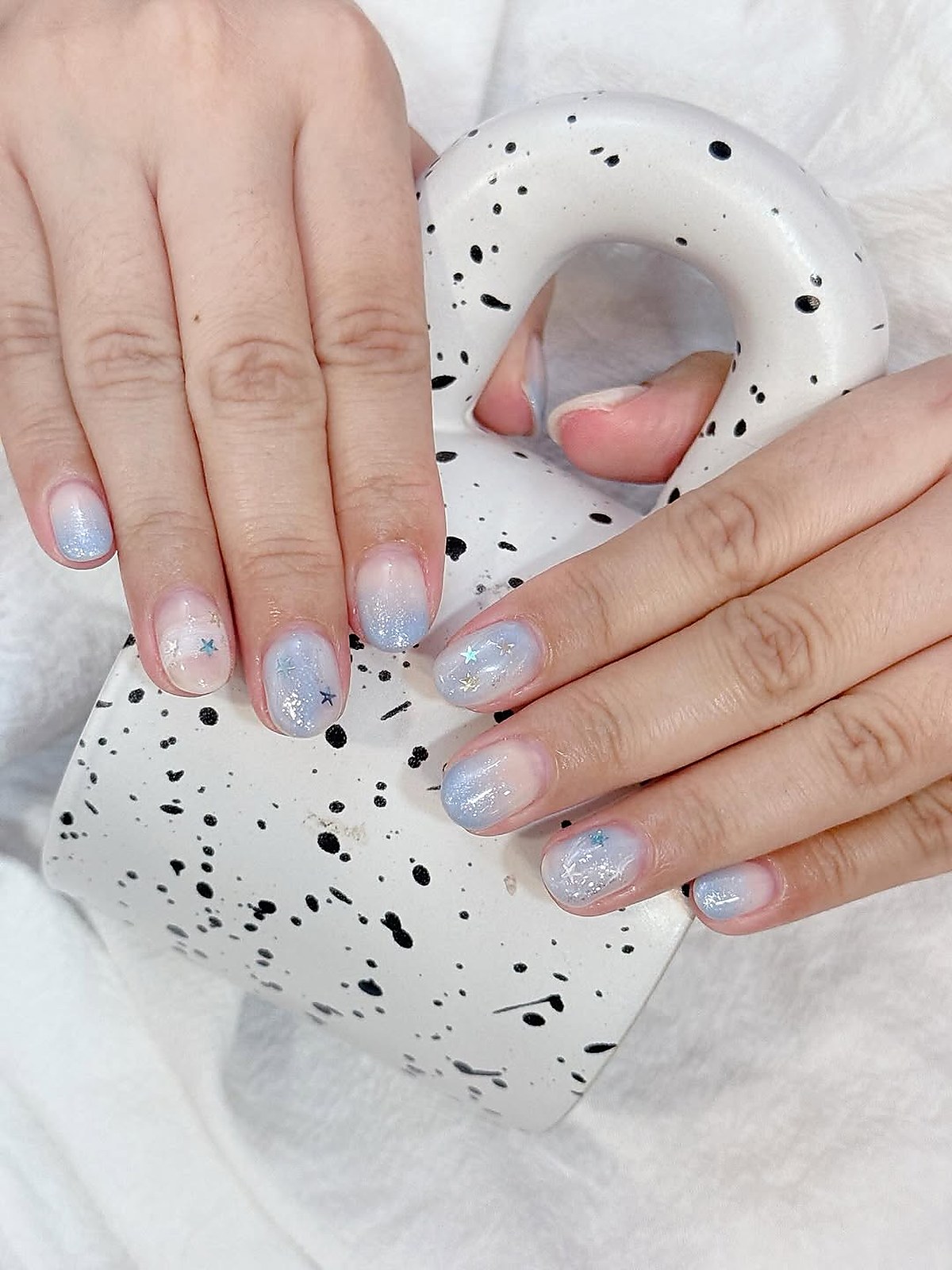 manicure_nail_art_design — manicure detail with soft tonal nail art