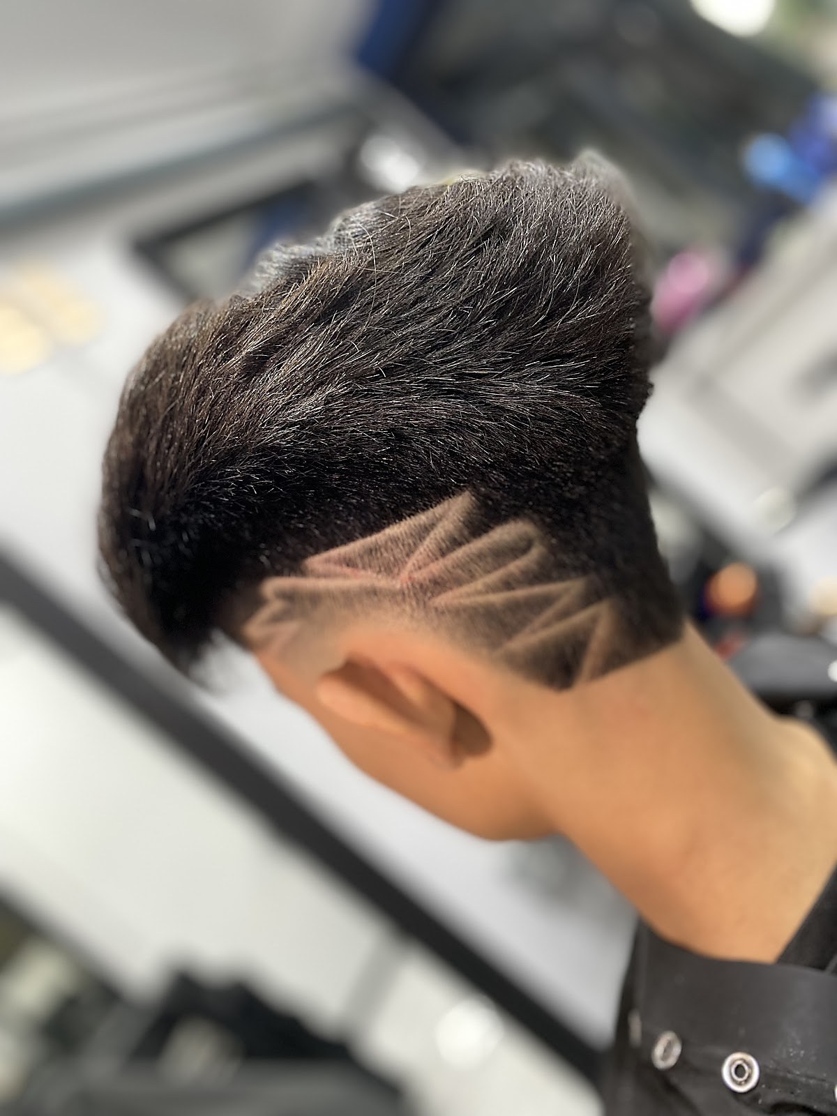 Modern undercut fade styling